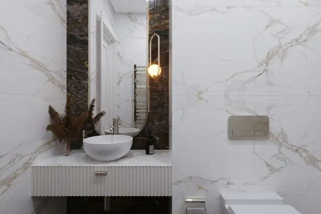 Baño revestido en mármol